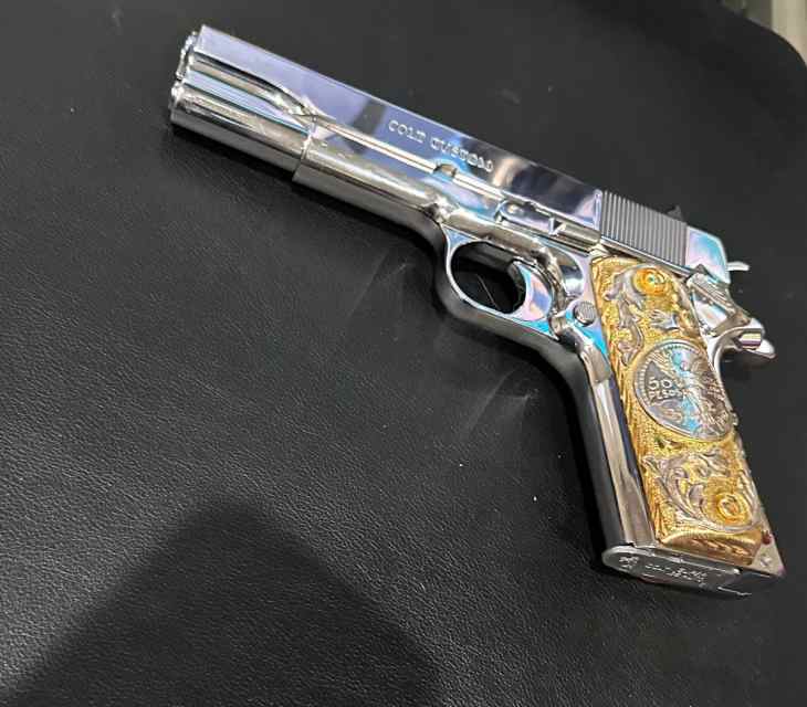 38 Super Colt Custom 1911 bright stainless