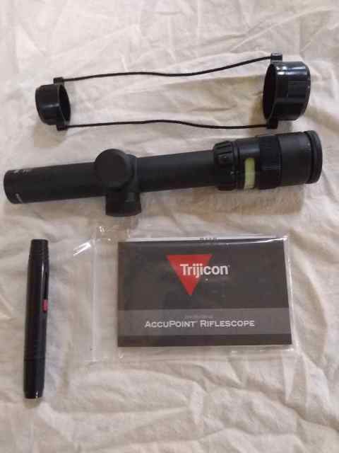 Trijicon Accupoint TR24G 1-4x24 scope