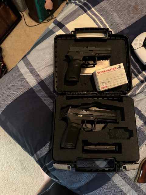 2 SIGs P320 with ammo